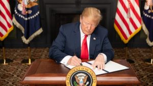 Trump signing document to issue more sanctions on Iran
